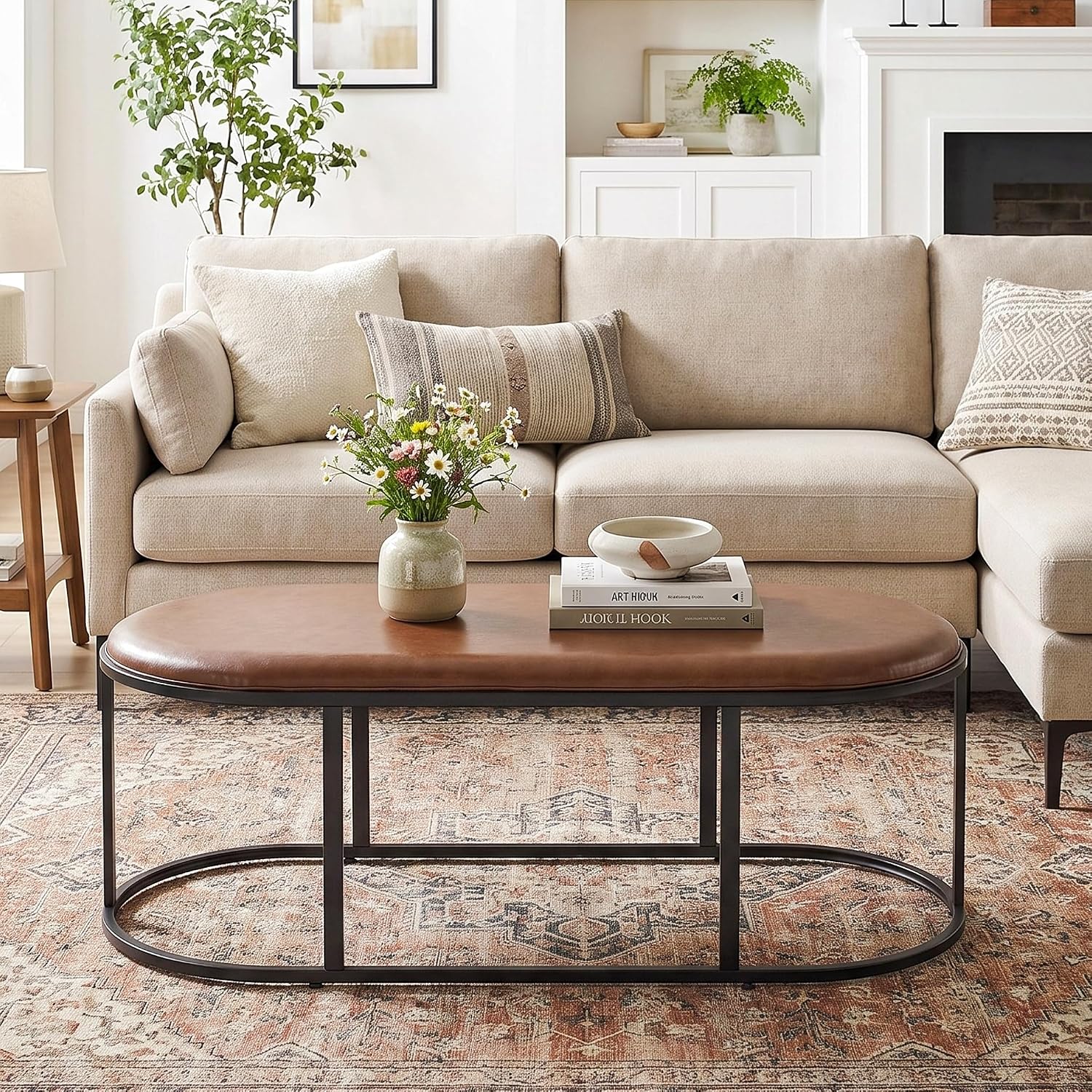 Oval Faux Leather Coffee Table, Black Metal Base